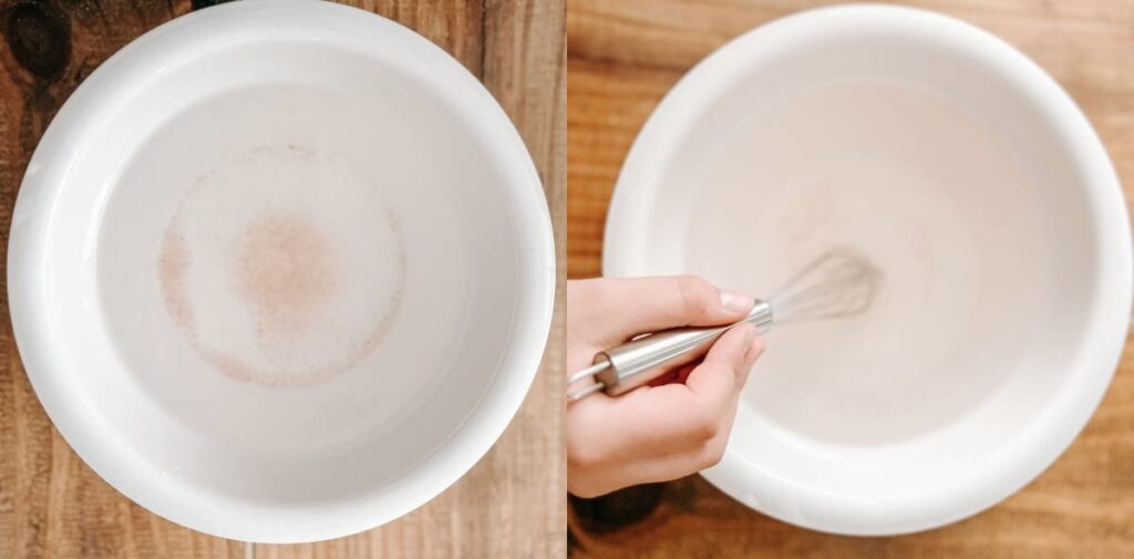 white bowl with water and salt in it.